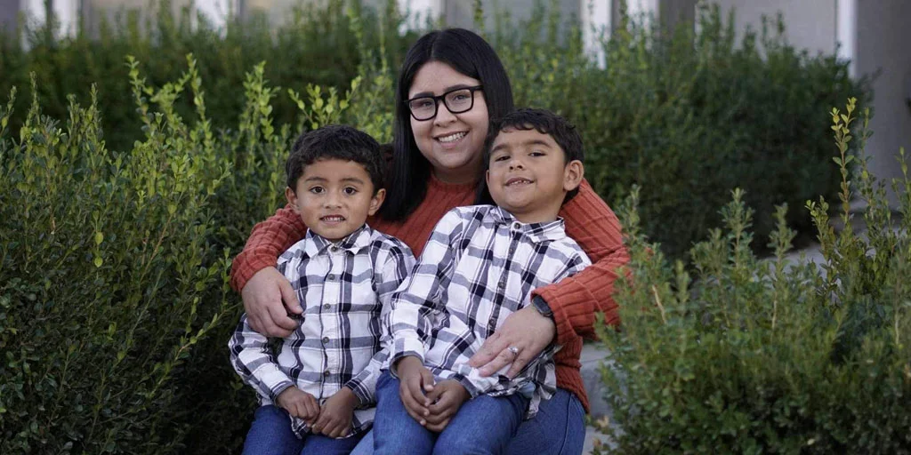 Image of Jessica and her two sons.